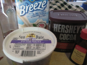 Nondairy milk, dates and cocoa powder